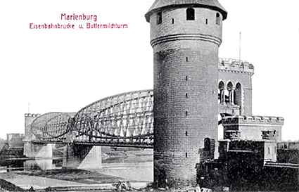 [Brama mostu kolejowego na prawym brzegu Nogatu]